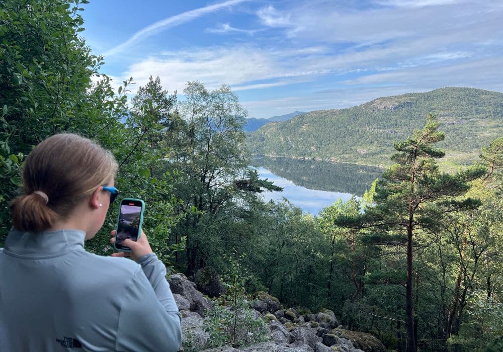 Troltunga Hike Norway Picture moment at the Lake - Traveling With a Teen